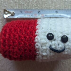 Red and White Crochet pill Smiley Plush
